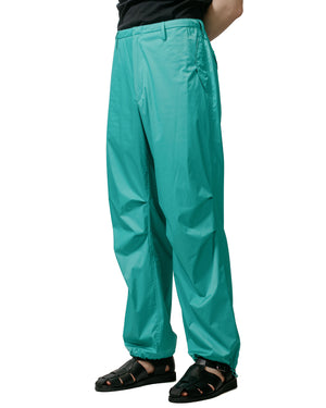 Auralee Hard Twist Polyester Satin Laminate Field Pants Turquoise Blue model front