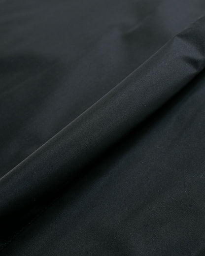 Auralee Hard Twist Polyester Satin Laminate Zip Blouson Black fabric